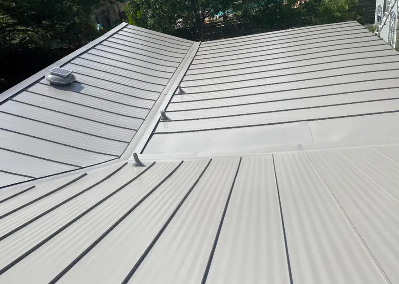 Solar attic fan installed on a metal roof for Roof Ventilation in East Kapolei